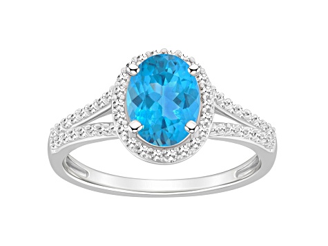 8x6mm Oval Blue Topaz 1/4 ctw Diamond Rhodium Over Sterling Silver Halo Ring