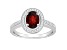 8x6mm Oval Garnet 1/5 ctw Diamond Rhodium Over Sterling Silver Halo Ring