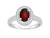 8x6mm Oval Garnet 1/5 ctw Diamond Rhodium Over Sterling Silver Halo Ring