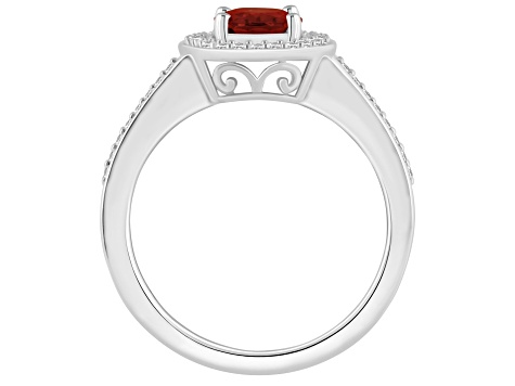 8x6mm Oval Garnet 1/5 ctw Diamond Rhodium Over Sterling Silver Halo Ring