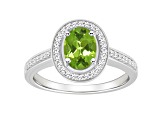 8x6mm Oval Peridot 1/5 ctw Diamond Rhodium Over Sterling Silver Halo Ring