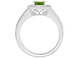 8x6mm Oval Peridot 1/5 ctw Diamond Rhodium Over Sterling Silver Halo Ring