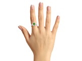 8x6mm Oval Peridot 1/5 ctw Diamond Rhodium Over Sterling Silver Halo Ring