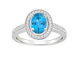 8x6mm Oval Blue Topaz 1/5 ctw Diamond Rhodium Over Sterling Silver Halo Ring