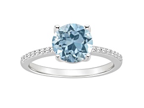 8mm Round Sky Blue Topaz and 1/10 ctw Diamond Rhodium Over Sterling Silver Ring
