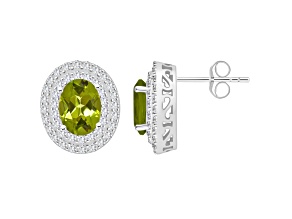 8x6mm Oval Peridot And White Topaz Accent Rhodium Over Sterling Silver Double Halo Stud Earrings