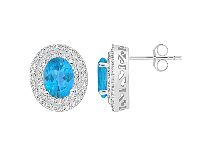 8x6mm Oval Swiss Blue Topaz And White Topaz Rhodium Over Sterling Silver Double Halo Stud Earrings