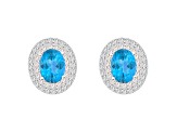 8x6mm Oval Swiss Blue Topaz And White Topaz Rhodium Over Sterling Silver Double Halo Stud Earrings
