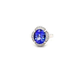 Tanzanite 12x10mm Oval and White Zircon Rhodium Over Sterling Silver Ring