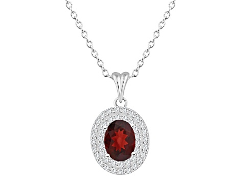 8x6mm Oval Garnet And White Topaz Accent Rhodium Over Sterling Silver Double Halo Pendant w/Chain