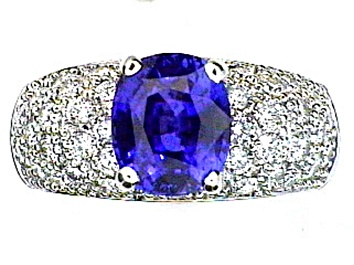 Picture of Cushion Blue Sapphire and White Diamond 18K White Gold Ring. 4.14 CTW