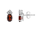 6x4mm Oval Garnet with Diamond Accents 14k White Gold Stud Earrings