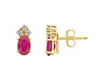 6x4mm Oval Ruby with Diamond Accents 14k Yellow Gold Stud Earrings