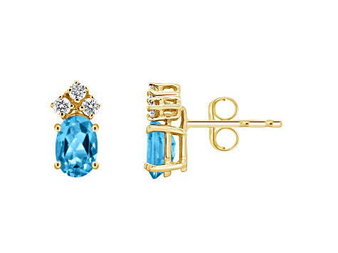 6x4mm Oval Blue Topaz with Diamond Accents 14k Yellow Gold Stud Earrings