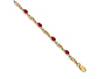 14k Yellow Gold and Rhodium Over 14k Yellow Gold Diamond and Oval Ruby Bracelet