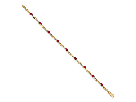 14k Yellow Gold and Rhodium Over 14k Yellow Gold Diamond and Oval Ruby Bracelet