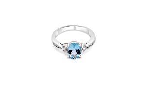 9x7mm Oval Aquamarine and White CZ Rhoidum Over Sterling Silver Ring, 1.53ctw