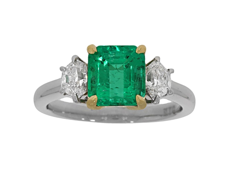 Emerald Step Cut Green Emerald and White Diamond Platinum Ring. 2.68 CTW