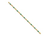 14k Yellow Gold and Rhodium Over 14k Yellow Gold Diamond and Oval Emerald Bracelet