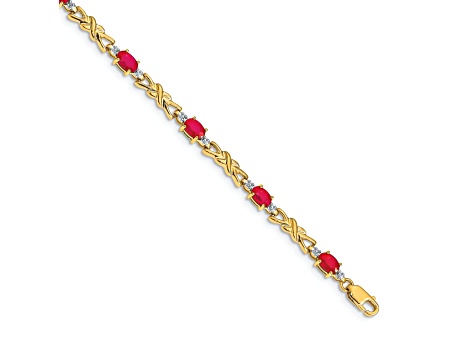 14k Yellow Gold and Rhodium Over 14k Yellow Gold Diamond and Oval Ruby Bracelet