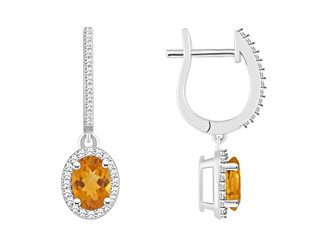 7x5mm Oval Citrine 1/3 ctw Diamond Rhodium Over Sterling Silver Halo Dangle Earrings