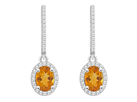 7x5mm Oval Citrine 1/3 ctw Diamond Rhodium Over Sterling Silver Halo Dangle Earrings