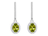 7x5mm Oval Peridot 1/3 ctw Diamond Rhodium Over Sterling Silver Halo Dangle Earrings