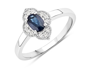 Blue Sapphire and Lab Grown Diamond Rhodium Over Silver Halo Ring 0.60ctw