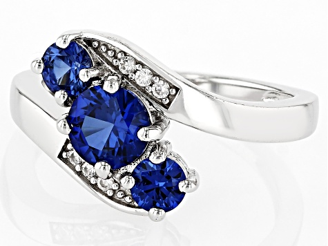 Blue Lab Created Sapphire Rhodium Over Sterling Silver Bypass Ring 1.40ctw