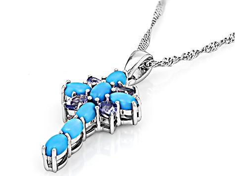 Blue Sleeping Beauty Turquoise Rhodium Over Silver Cross Pendant With Chain .44ctw