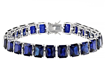 Picture of Blue Lab Created Sapphire Rhodium Over Sterling Silver Tennis Bracelet 58.65ctw
