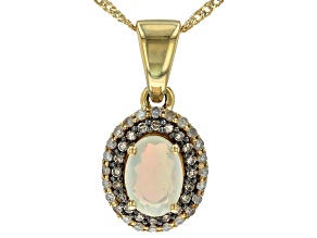 Ethiopian Opal With White And Champagne Diamond 10k Yellow Gold Pendant With Chain 0.70ctw