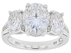 Moissanite Platineve Three Stone Ring 4.90ctw DEW.