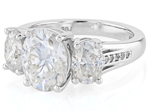 Moissanite Platineve Three Stone Ring 4.90ctw DEW.