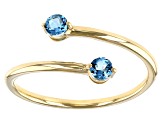 Swiss Blue Topaz 10k Yellow Gold Bypass Ring .29ctw