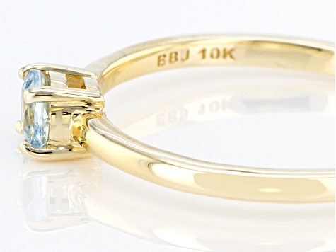 Blue Aquamarine 10k Yellow Gold Solitaire Ring. 0.19ctw