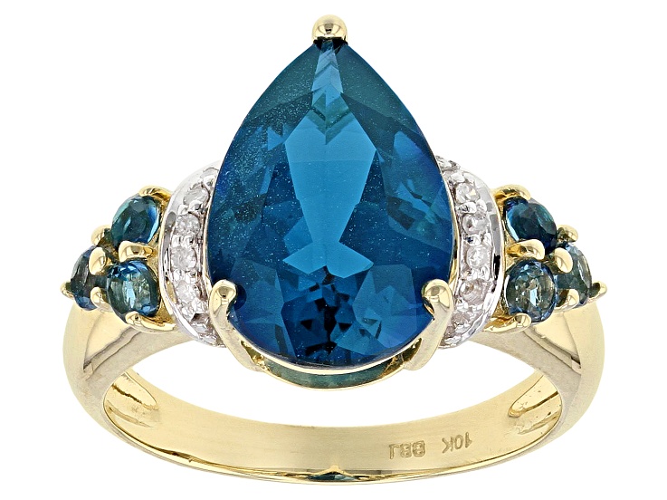 Sizes 4-13 10k Yellow or White Gold 7 x 5 mm Pear Blue Topaz And Diamond Ring