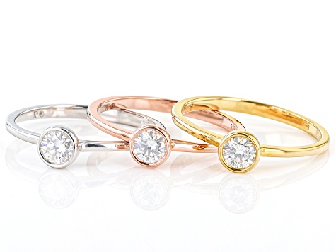 Moissanite Platineve and 14k rose and yellow gold over sterling silver ring set of three .69ctw DEW