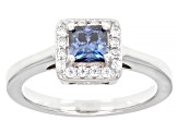 Blue and colorless moissanite platineve halo ring .90ctw DEW