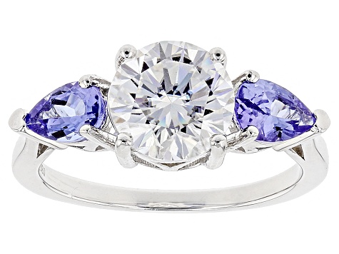 Moissanite Fire® 1.90ct DEW Round And .78ctw Pear Shape Tanzanite Platineve™ Ring