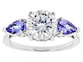 Moissanite Fire 1.90ct DEW Round And .78ctw Pear Shape Tanzanite Platineve Ring