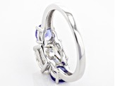Moissanite Fire® 2.00ct DEW Cushion Cut And 1.04ctw Round Tanzanite Platineve™ Ring