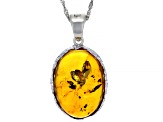 Orange amber rhodium over sterling silver pendant with chain