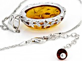 Orange amber rhodium over sterling silver pendant with chain