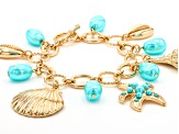 Pearl Simulant Gold Tone Sea Life Charm Bracelet