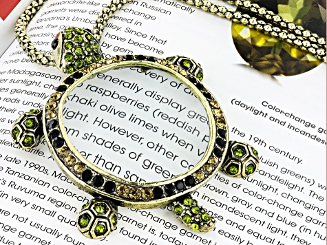 2028 Gold-Tone Green Crystal Magnifying Glass Necklace