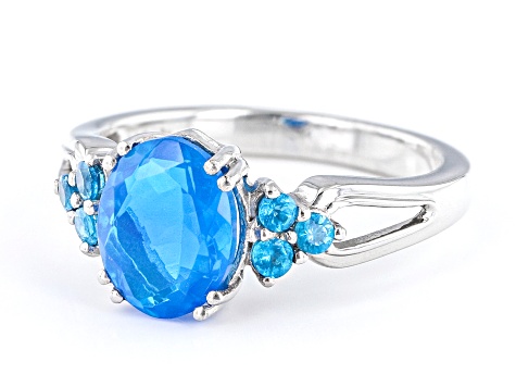 Inlayed Caribbean Blue Fire selling Opal on Sterling Silver Ring with Tanzanite Colored Gem, Cubic Zirconia Accents and Rhodium Plating