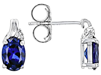 Picture of Blue Lab Created Sapphire Rhodium Over Sterling Silver Solitaire Earrings 1.50ctw