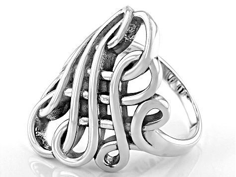 Pre-Owned Sterling silver oxidized swirl ring. Measures approximately 1.12 inches in width and is no