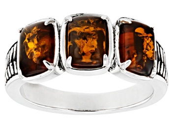 Picture of Pre-Owned Orange Amber Rhodium Over Sterling Silver Ring